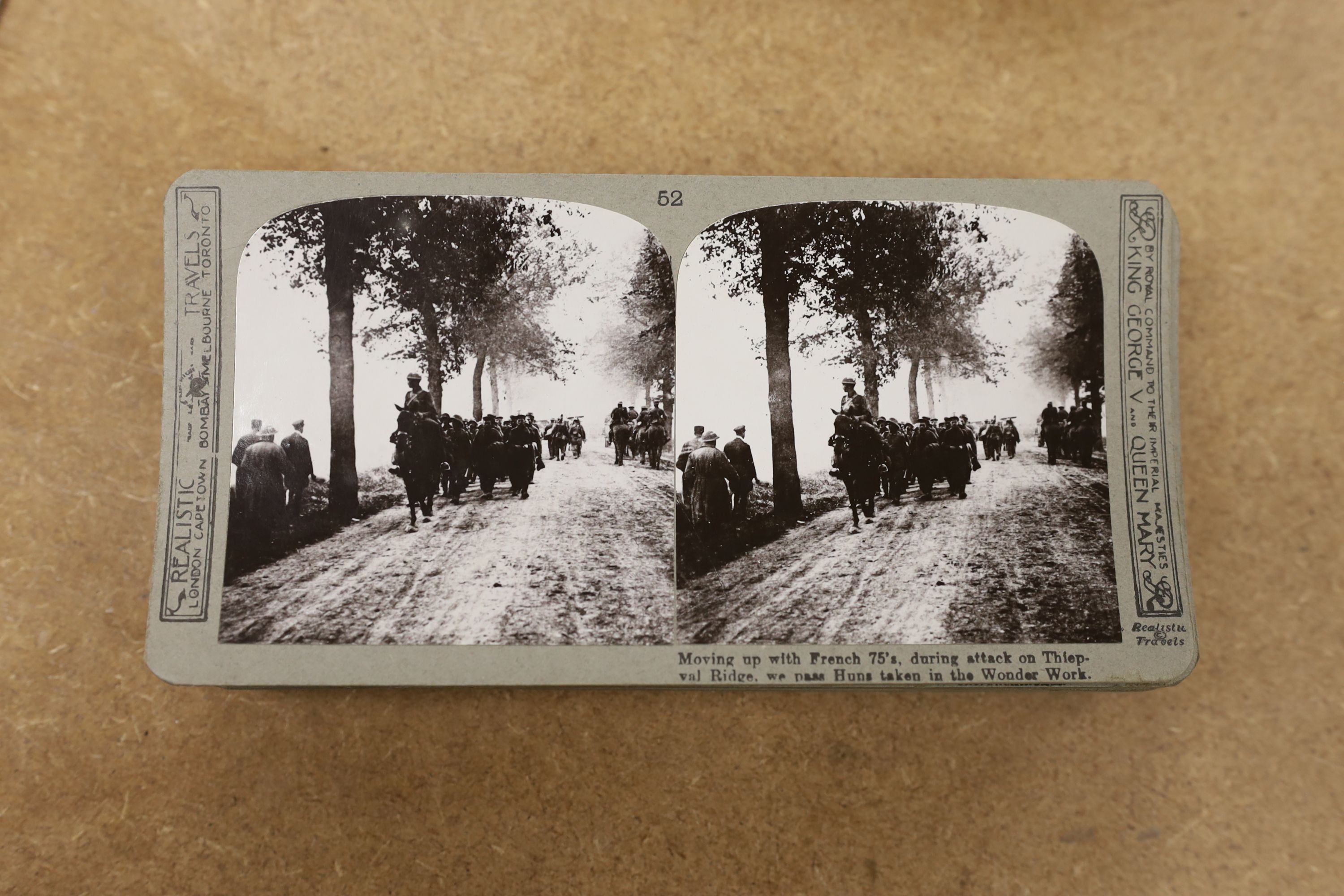 A set of The Great War stereoscopic slides, in case, and a viewer, 31 cms long.